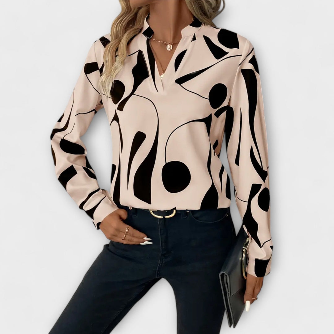 Edith - Elegante blouse met lange mouwen en spitse hals
