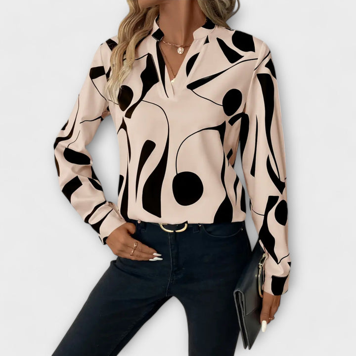 Edith - Elegante blouse met lange mouwen en spitse hals