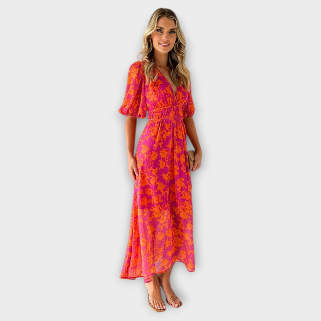 Katty – Midi-jurk met V-hals, bloemenpatroon en puffmouwen