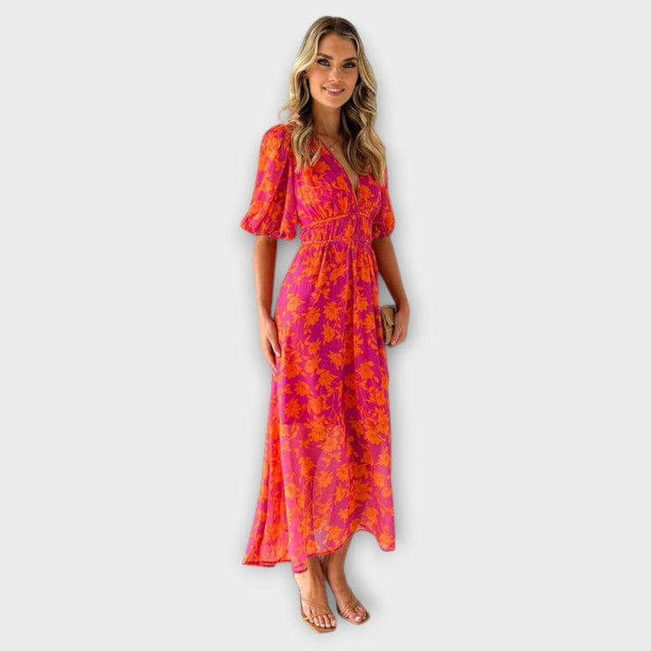 Katty – Midi-jurk met V-hals, bloemenpatroon en puffmouwen