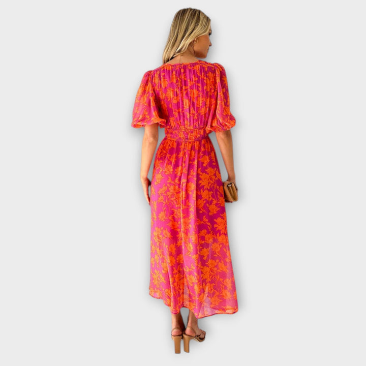 Katty – Midi-jurk met V-hals, bloemenpatroon en puffmouwen
