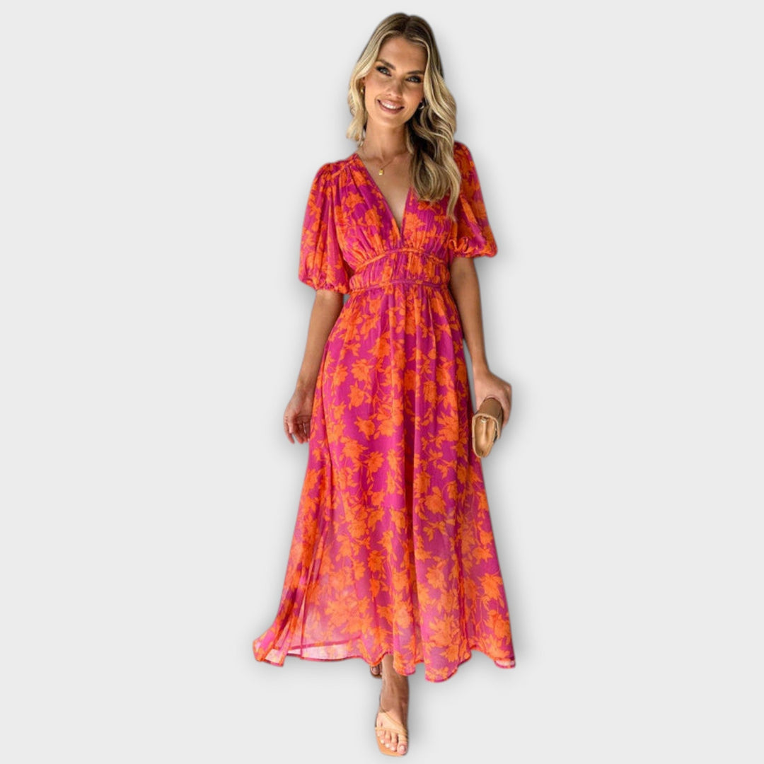 Katty – Midi-jurk met V-hals, bloemenpatroon en puffmouwen