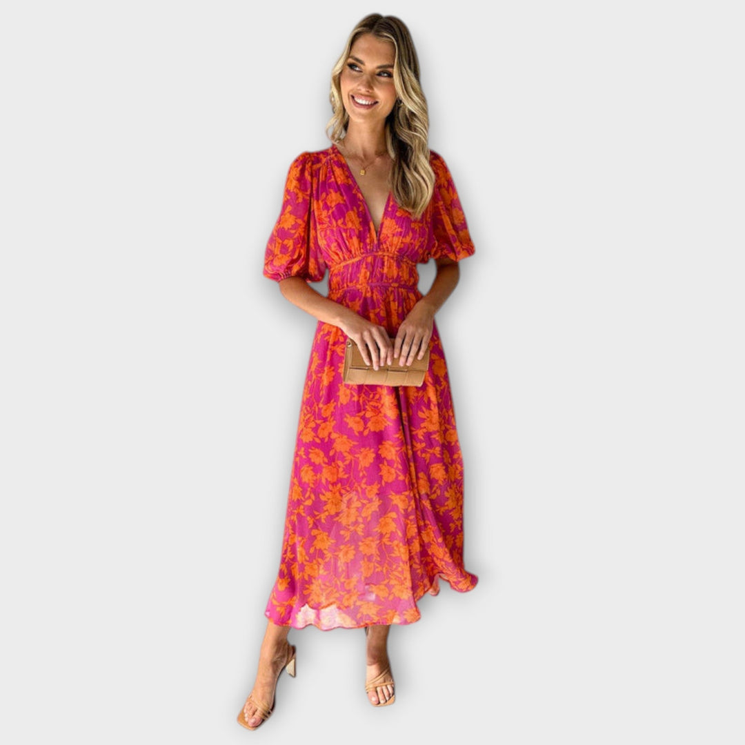 Katty – Midi-jurk met V-hals, bloemenpatroon en puffmouwen