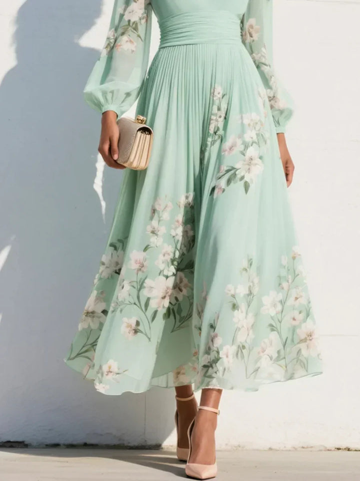 Elga - Maxi plissé jurk in chiffon met bloemenpatroon