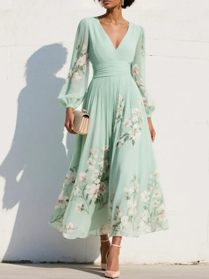 Elga - Maxi plissé jurk in chiffon met bloemenpatroon