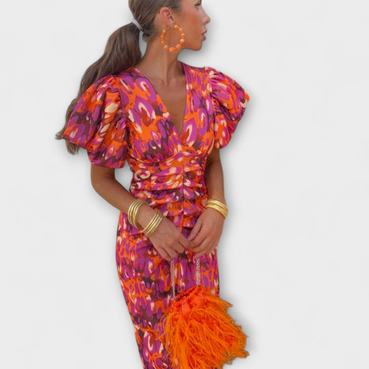 Simona - Elegante jurk met V-hals en pofmouwen