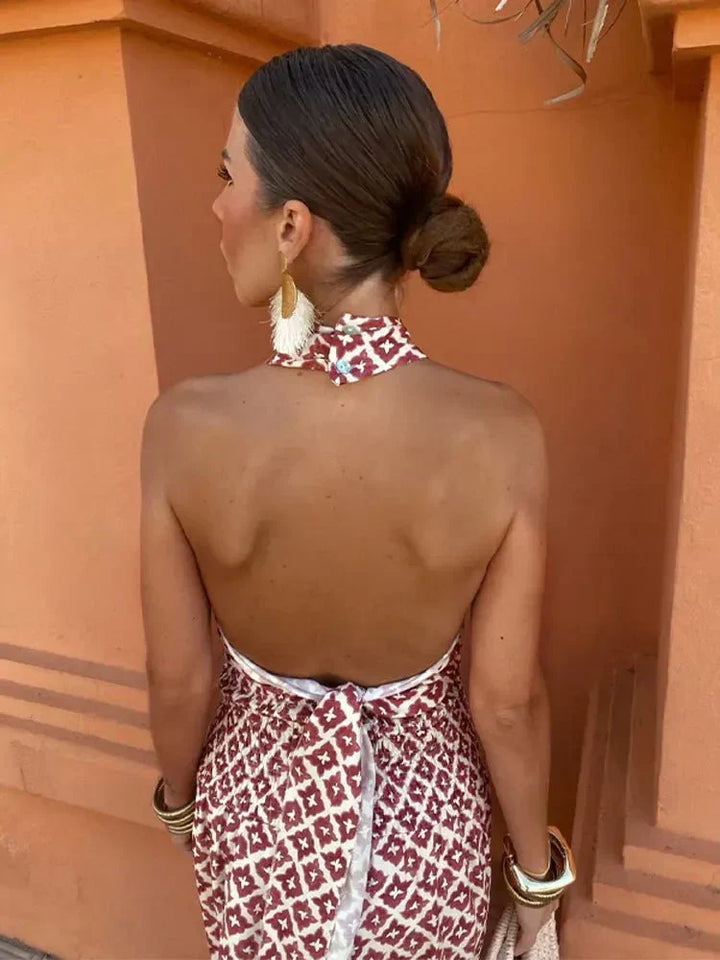 Cleo | Midijurk met halterhals, uitsparing en geometrisch motief voor trouwgasten