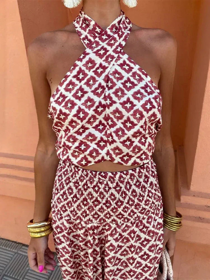 Cleo | Midijurk met halterhals, uitsparing en geometrisch motief voor trouwgasten