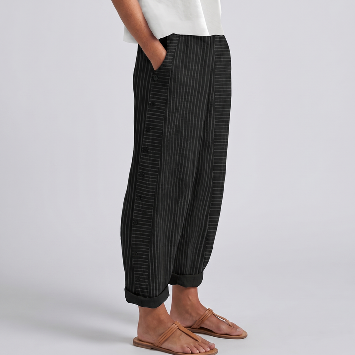 Amika | Gestreepte 7/8-broek met knopenrij opzij voor dames